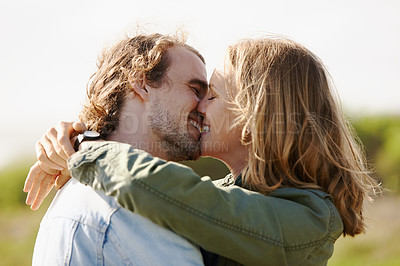 Buy stock photo Romantic, couple and hugging and kiss together, nature and scenery with passionate people. Love, care and embrace on date with smile, vacation and holiday for relationship on Sweden outdoors trip