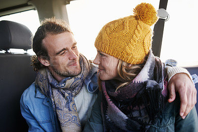 Buy stock photo Couple, hug and happy together in car, travel and bonding with road trip for date or anniversary. Love, trust and commitment with partner, loyalty and cuddle for warmth in winter, vacation and smile