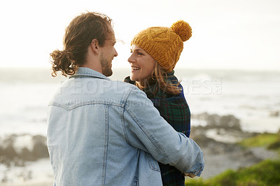 Buy stock photo Hug, nature and couple with love, beach and happiness with weekend break and travel with adventure. Outdoor, romance or embrace with woman and man with date, seaside or summer with holiday or journey
