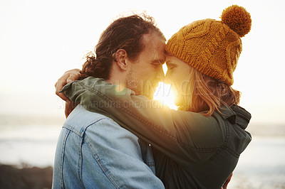 Buy stock photo Hug, outdoor and couple with love, sunshine and lens flare with holiday for embrace or honeymoon. Romance, relationship or man with woman or happiness with vacation or journey with journey or date