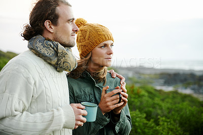 Buy stock photo Hiking, couple and drinking coffee in nature on holiday, vacation or travel together in winter with mockup space. Trekking, man and woman with tea cup outdoor in the countryside, embrace and thinking