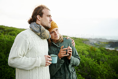 Buy stock photo Hiking, couple and drinking coffee outdoor on holiday, vacation or travel together in winter with mockup space. Trekking, man and woman with tea cup in the countryside, embrace or thinking in nature