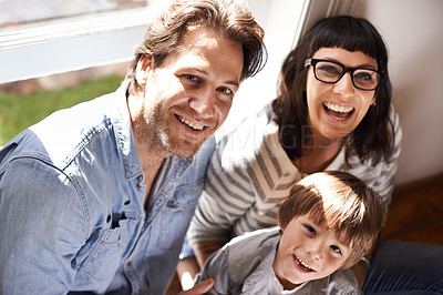 Buy stock photo Parents, boy and smile with family portrait in home, happy son and bonding for child development and relationship. Kid, childhood and vacation house with people on holiday, fun and together with love