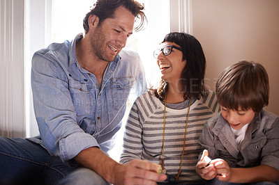 Buy stock photo Happy, mother or father with child in home, house or apartment together for support, care or love. Boy, mom or dad bonding with kid and smile to enjoy family vacation, holiday or relax in England