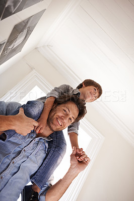 Buy stock photo Father with boy on his shoulders, portrait and home with smile and love with single parent and happiness. Family, dad carrying son and childhood with fun and playing with joy and bonding together
