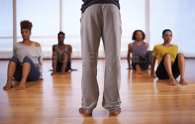 Buy stock photo People, dancer and personal trainer with class of student in fitness, workout or pilates at the studio. Rear view of instructor talking to group in body warm up or stretching for health and wellness