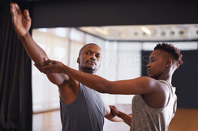 Buy stock photo Art, creative or dance with student and teacher in class together for theater performance training. Fitness, learning and school with black man instructor teaching dancer in studio for production