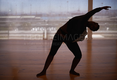 Buy stock photo Person, silhouette and fitness with dancer stretching body for workout or indoor exercise at studio. Performer or ballet in practice, training or balance for graceful dancing, health and wellness