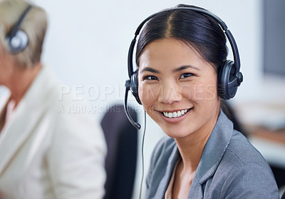 Buy stock photo Help desk, portrait and phone call with Asian woman, headset and consultant at customer support office. Mic, telemarketing and client service agent at callcenter with happy, friendly face and smile