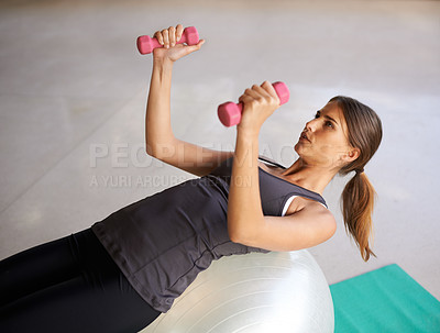 Buy stock photo Exercise ball, home and woman with dumbbells, energy or cardio with balance or body with wellness. Health, person or athlete with equipment for training or weights for workout with challenge or power