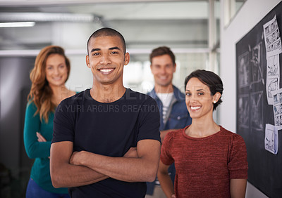 Buy stock photo Cropped portrait of a team of young creative professionals standing in the office