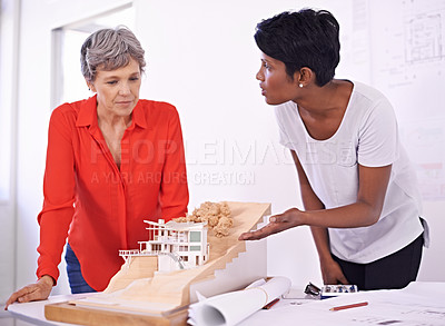 Buy stock photo Model, floor plan or women with engineering teamwork for development project or planning on paper. Architecture, people or group of designers talking in collaboration for blueprint of office building