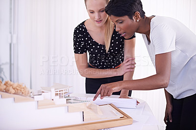 Buy stock photo Model, floor plan or people with engineering teamwork for development project or planning on paper. Architecture, women or group of designers talking in collaboration for blueprint of office building