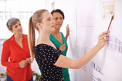 Buy stock photo Shot of a group of female architects working together on a project