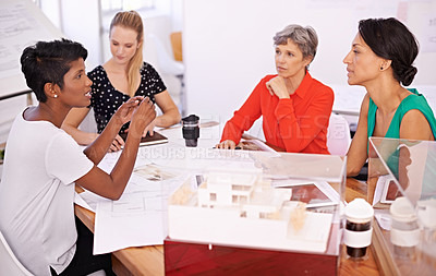 Buy stock photo Group of people, architect or business in meeting, teamwork or planning of creative brainstorm. Businesswomen, blueprint or model as corporate, diversity or collaboration in property development