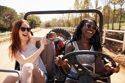 Buy stock photo Happy women, photography and vacation with road trip in nature and bonding together for adventure in outdoor. Friends, driving or journey in convertible van on holiday, countryside or memory in texas