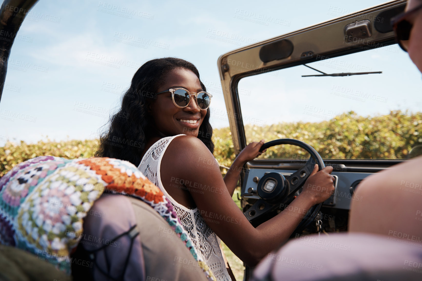 Buy stock photo Happy woman, talking and freedom on road trip in countryside, bonding or travel for tourism in nature. Friends, driving and discussion in suv on summer holiday, care and adventure on tour in texas