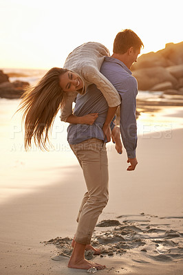 Buy stock photo Beach, man and woman with playful love together for romantic date, travel or holiday on island. Ocean, vacation and couple smile in sand for tropical adventure for honeymoon, anniversary and sunset