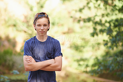Buy stock photo Travel, portrait and teenager with arms crossed in forest for adventure, explore or skill development outdoor. Face, kid and boy with pride in nature for learning, journey or summer, break or camping
