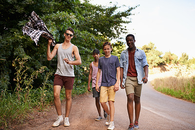 Buy stock photo Shot of a group of boys having fun outdoors