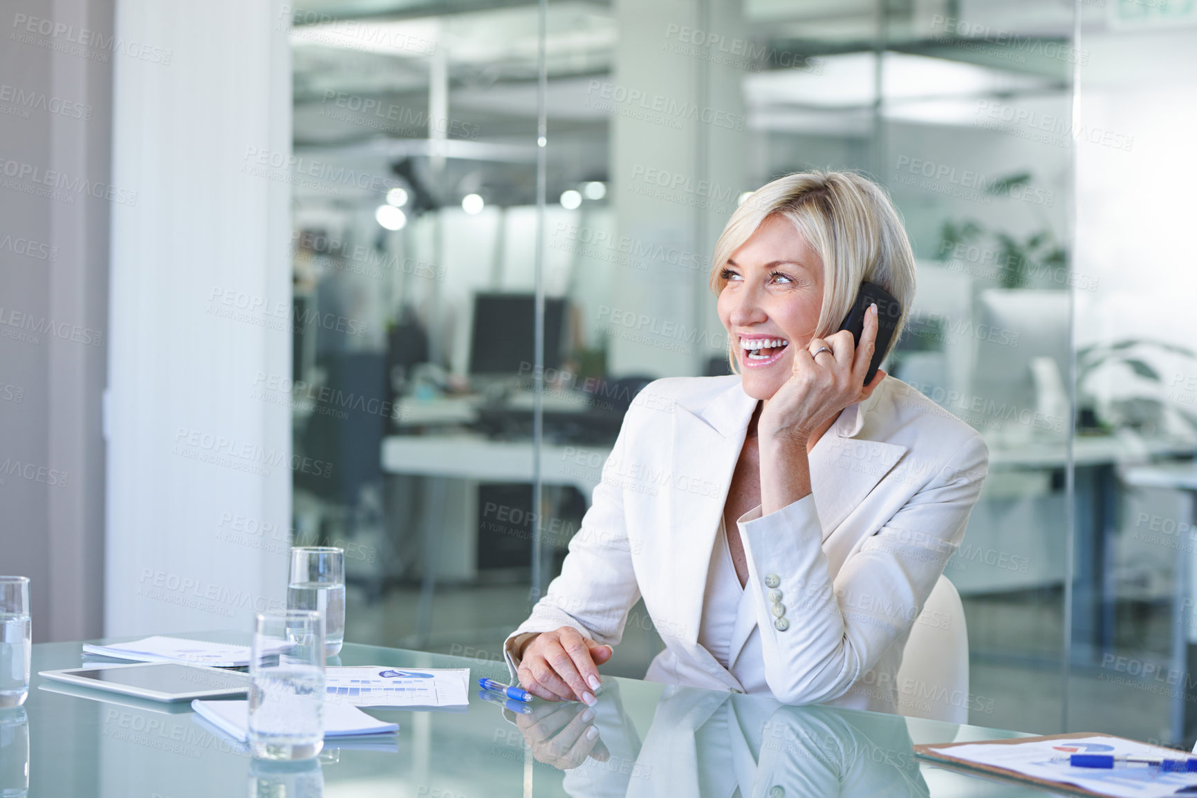 Buy stock photo Business woman, phone call and laugh in boardroom with networking and smile in an office. Mobile, professional and operations research analyst of a company with discussion at a corporate workplace 