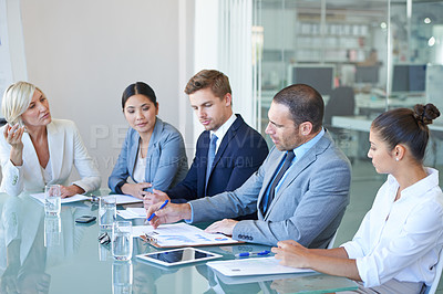 Buy stock photo Boardroom, business people and meeting with executive team or management for b2b negotiation or planning. Men and woman at office table with finance paperwork talking about an opinion or solution