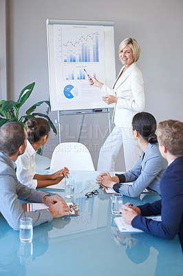 Buy stock photo Business people in a meeting, presentation with data analytics and woman speaker, leadership and graphs. Analysis of research in seminar in conference room with corporate group in collaboration 