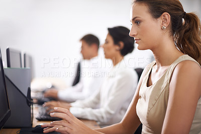 Buy stock photo Business woman, computer and typing with team in call center for email, support or online service at office. Female person, consultant or employee working on desktop PC with group or agency for help