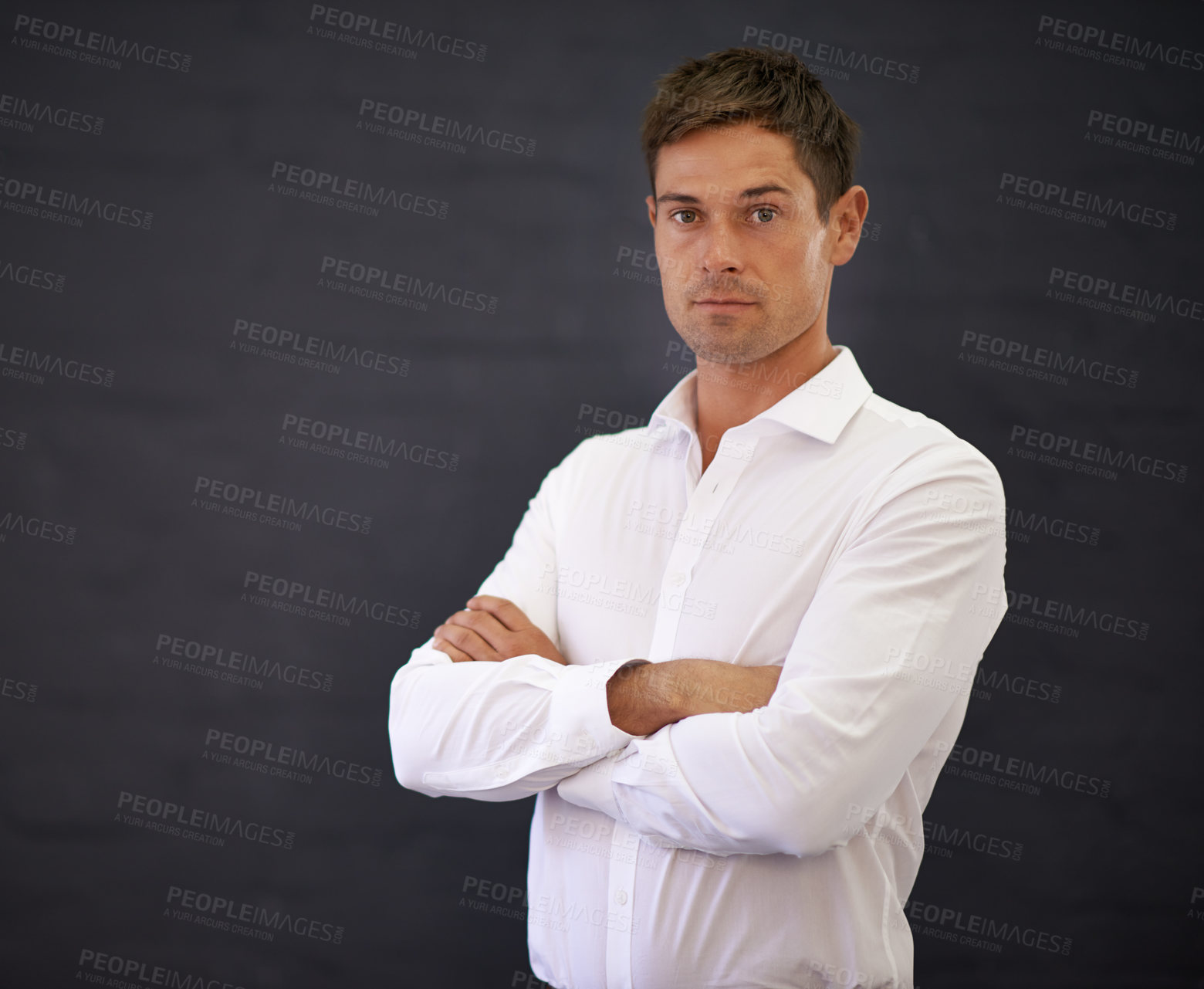 Buy stock photo Businessman, portrait and professional with confidence for career or startup on a dark studio background. Serious man or handsome employee and arms crossed in leadership or management on mockup space