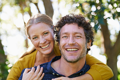 Buy stock photo Cropped shot of an affectionate husband and wife standing outdoors