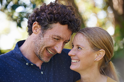 Buy stock photo Happy, couple and smile outdoor for love and bonding, trust and support in commitment for marriage. Partner, loyalty and joy with people in nature for fresh air, date and wellness in relationship