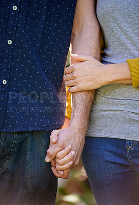 Buy stock photo Cropped shot of an affectionate husband and wife standing outdoors