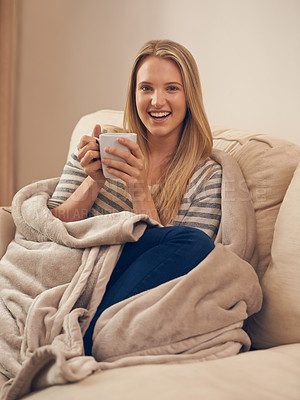 Buy stock photo Happy, portrait and woman on a sofa with coffee break, relax or chilling on weekend in her home. Face, smile and female person in a living room with tea cup for resting, peaceful or me time in house