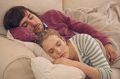 Buy stock photo Sleeping, peace and couple relax on a sofa with care, support and safety, security and bonding in their home. Love, calm and tired people embrace in living room in comfort, nap or resting in a house