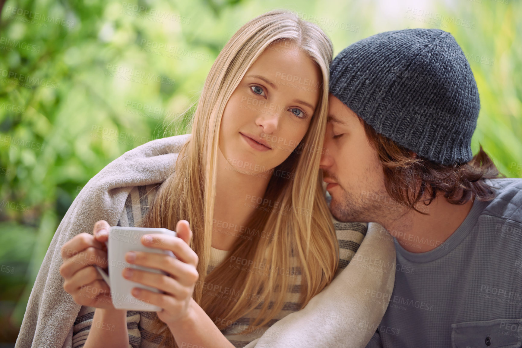 Buy stock photo A cute couple bonding over a cup of coffee