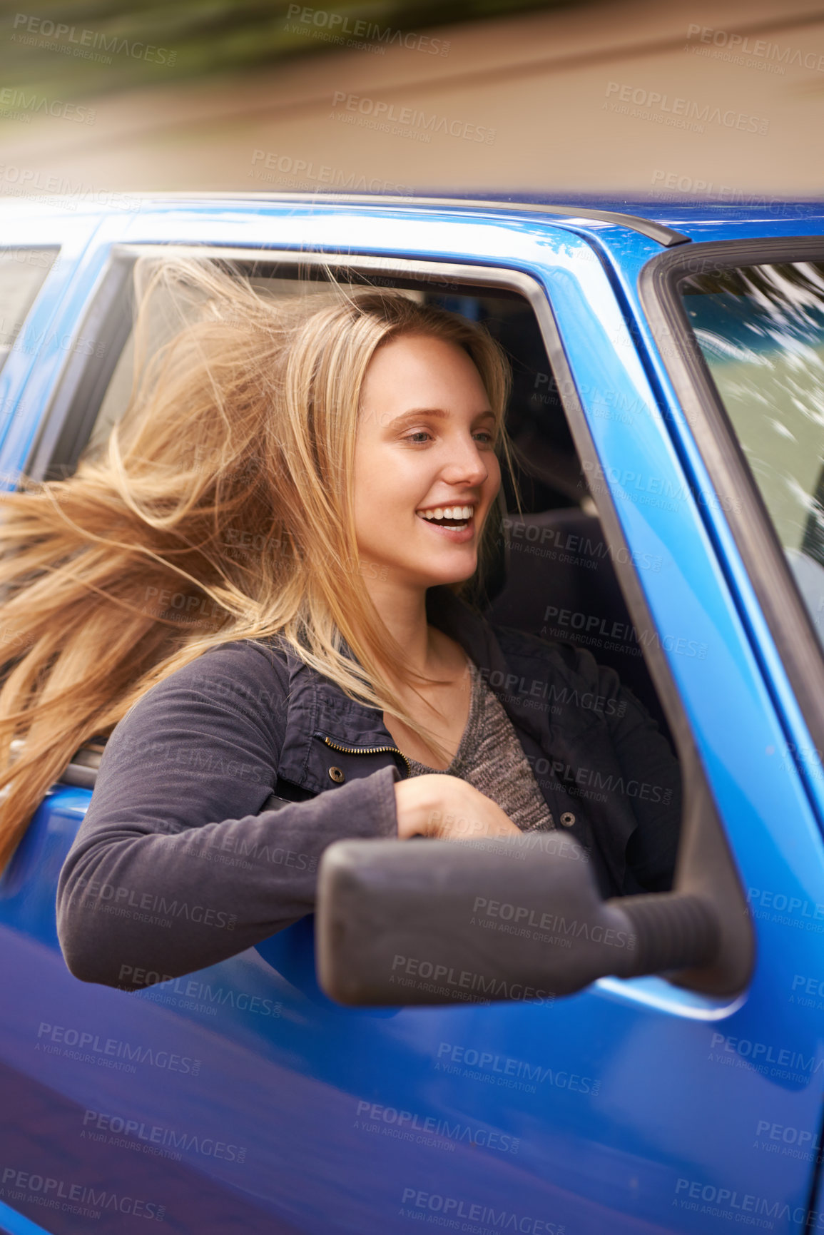 Buy stock photo Road trip, travel and woman with wind in car for adventure, journey and commute for vacation, freedom and holiday. Transport, happy and excited person in vehicle for fun, driving and relax on street