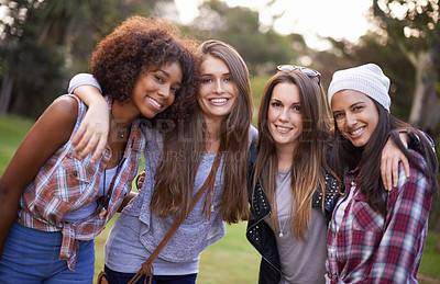 Buy stock photo Cropped shot of a group of young women enjoying the outdoors together