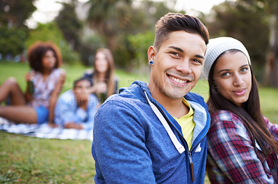 Buy stock photo Couple, smile and portrait with love in park with bonding and fun on campus outdoor. Students, grass and happy together in a university garden on break on a picnic with college people with hipster