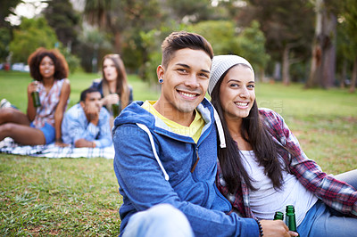 Buy stock photo Couple, smile and portrait with beer in park with bonding and fun on campus outdoor. Students, grass and happy together in a university garden on a break on a picnic with college people with drinks