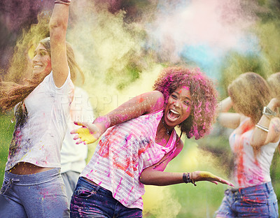 Buy stock photo Shot of happy friends having fun with powder paint