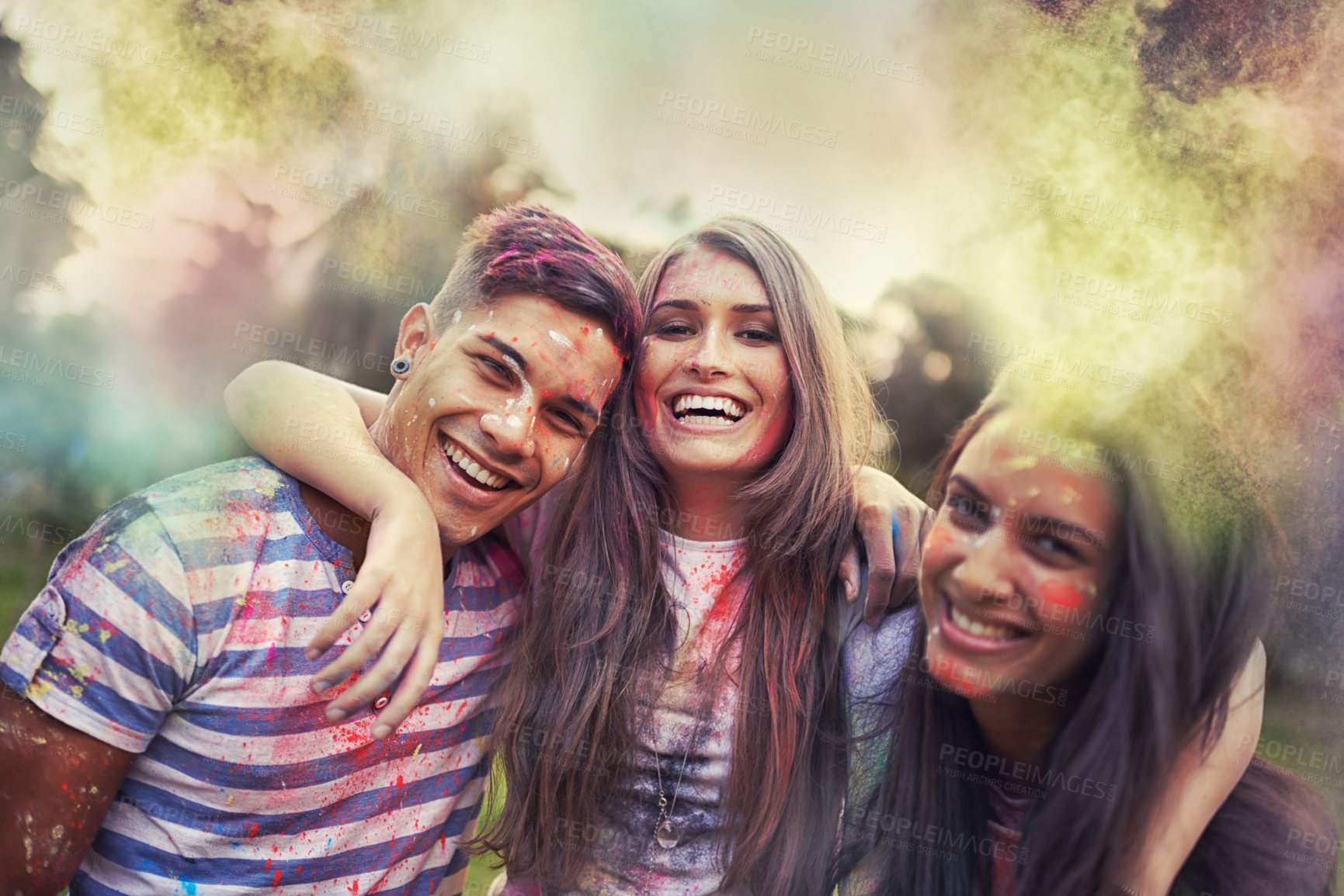 Buy stock photo Shot of happy friends having fun with powder paint