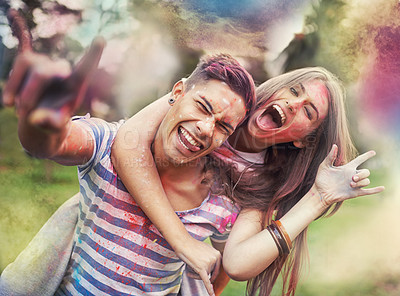 Buy stock photo Happy, powder paint and couple portrait with rock hand sign with Holi festival and colorful event with smile. Celebration, love and excited in nature with fun people and crazy color dust for party