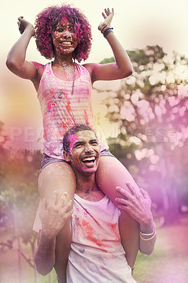 Buy stock photo Color, festival and couple with smile for fun, Holi and outdoor social gathering for spring, nature and energy. Powder, paint splash and celebration in park with man, woman and trees at happy event 