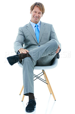 Buy stock photo Happy businessman, sitting and studio portrait with confidence in corporate career and professional in suit. Entrepreneur, smile or face in chair for job satisfaction or ambition by white background