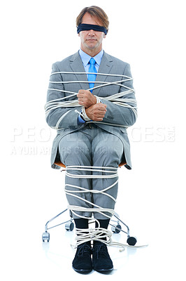 Buy stock photo Businessman, tied up and hostage with chair in kidnapped, robbery or silence on a white studio background. Man or employee with ropes or handcuffs in crime, theft or business corruption on mockup