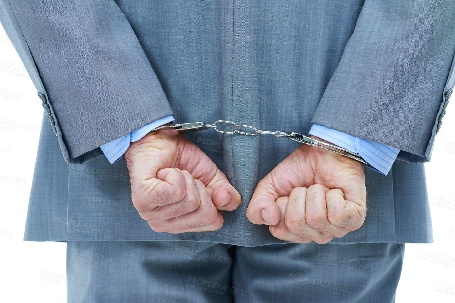 Buy stock photo Businessman, hands and cuffs with crime for theft or corruption on a white studio background. Closeup of man or employee back tied up with chain for arrest, criminal or illegal bribery of the law