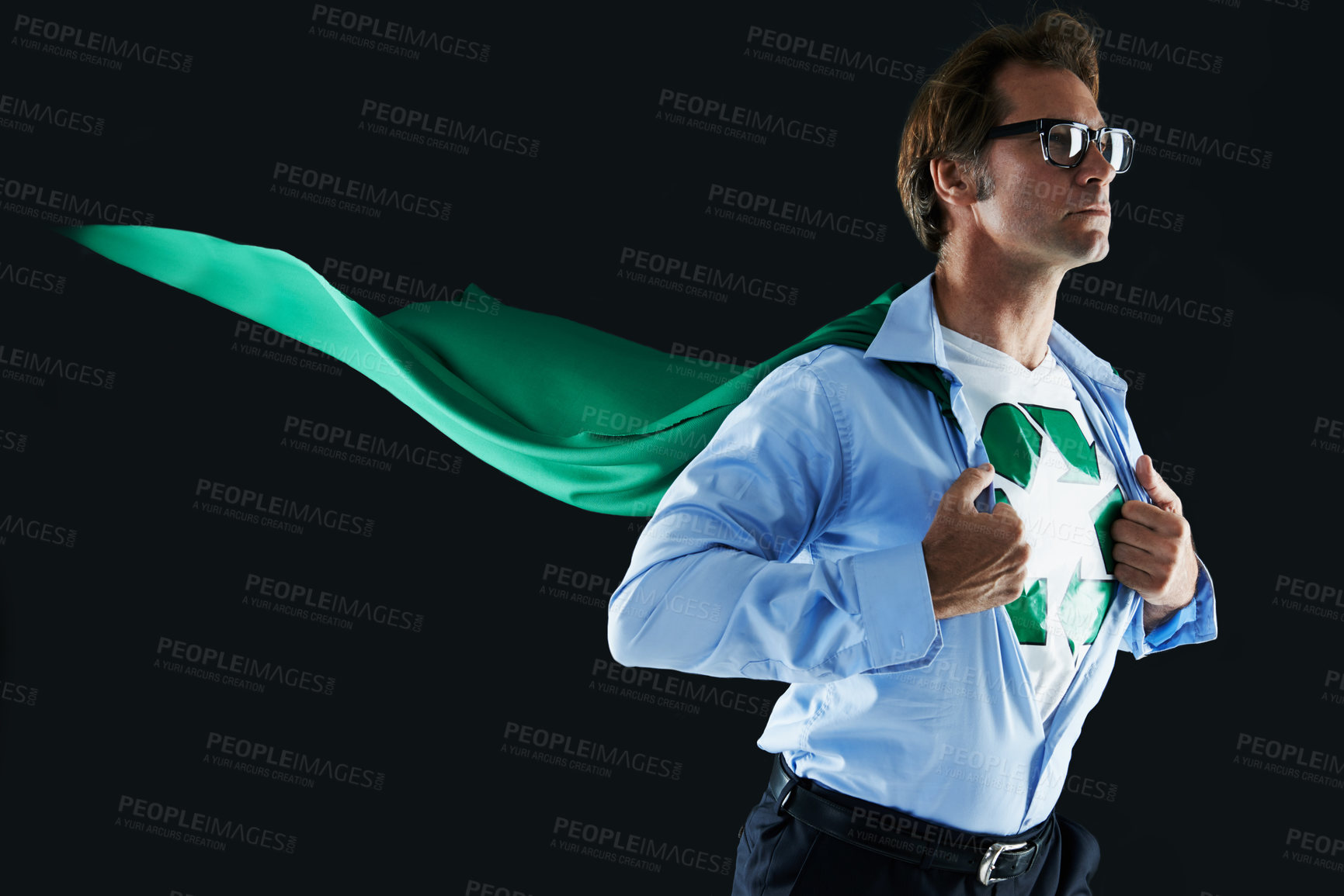 Buy stock photo Cropped shot of a superhero changing into his costume