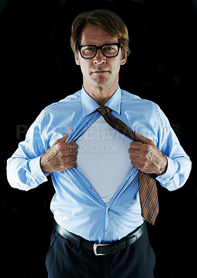 Buy stock photo Cropped shot of a businessman ripping his shirt open