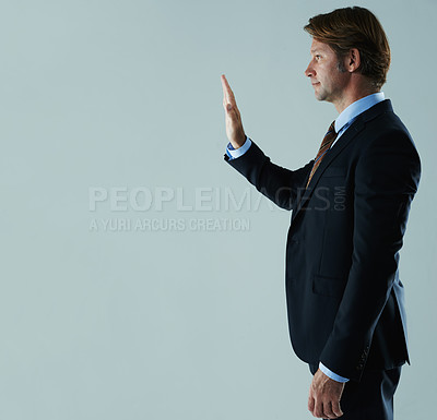Buy stock photo Business man, suit and hand for wave, stop or gesture for symbol or interaction in corporate or company. Young person, executive or professional with arm up for signal, direct or touch on mockup