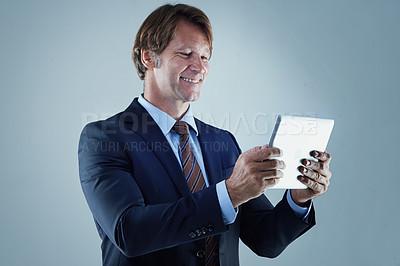 Buy stock photo Happy, businessman and tablet for communication, information technology and working in corporate career. Leadership, manager and ceo with digital pad for email, web and internet on studio background
